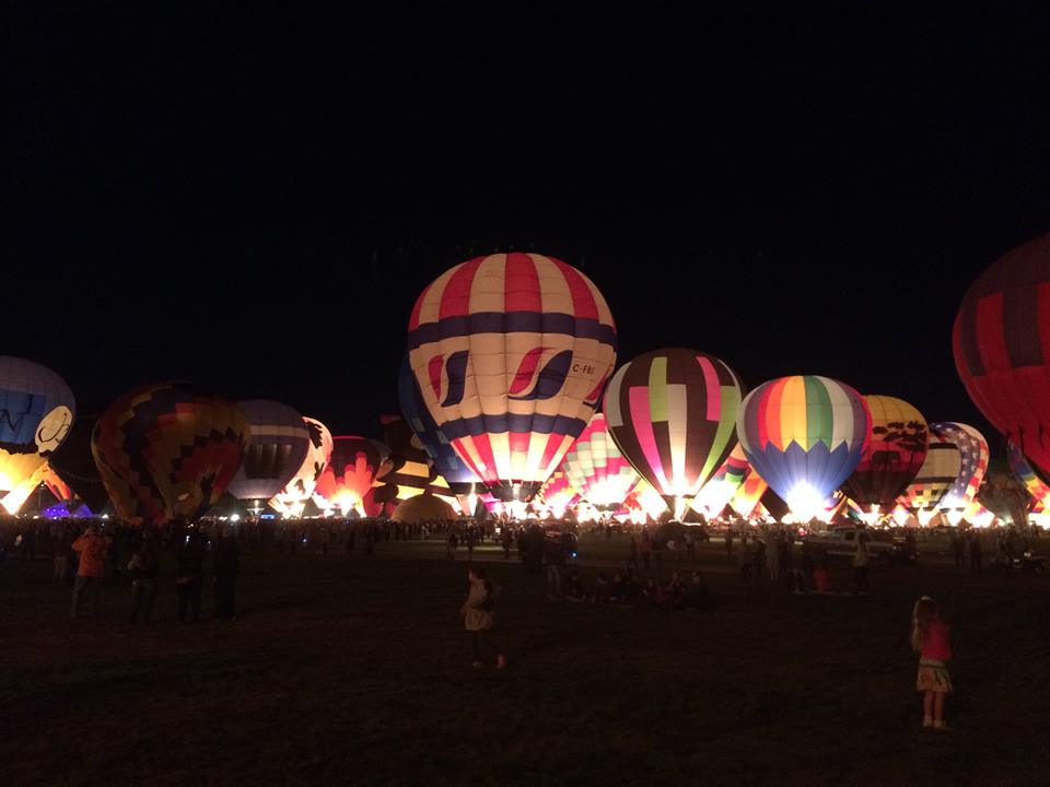 Another great glow picture. The light you see inside the balloons is from the flame used to heat the air.